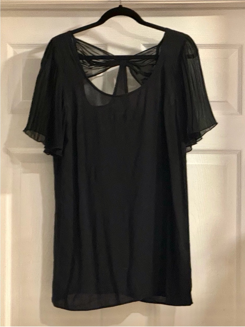 Solemio Black mesh top with Sheer Flutter Sleeves open back fits large